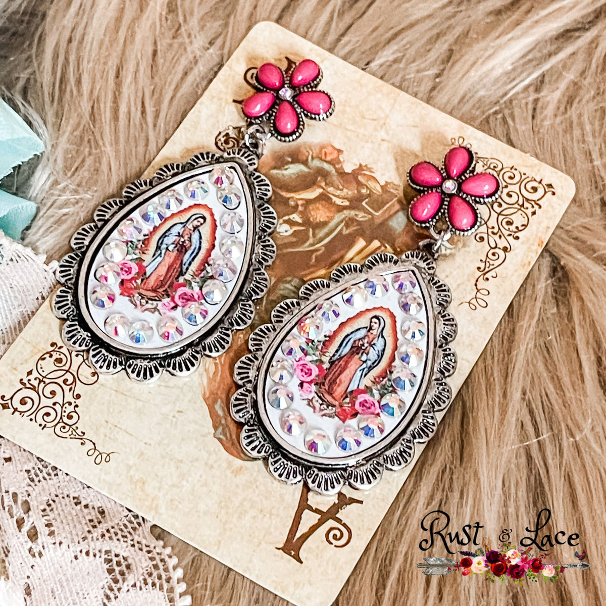 Style like a saint with the Mother Mary Earrings! Stand out from the crowd with this unique 2.25" accessory, complete with a sparkling rhinestone accent. Make a bold statement and show off your daring style!